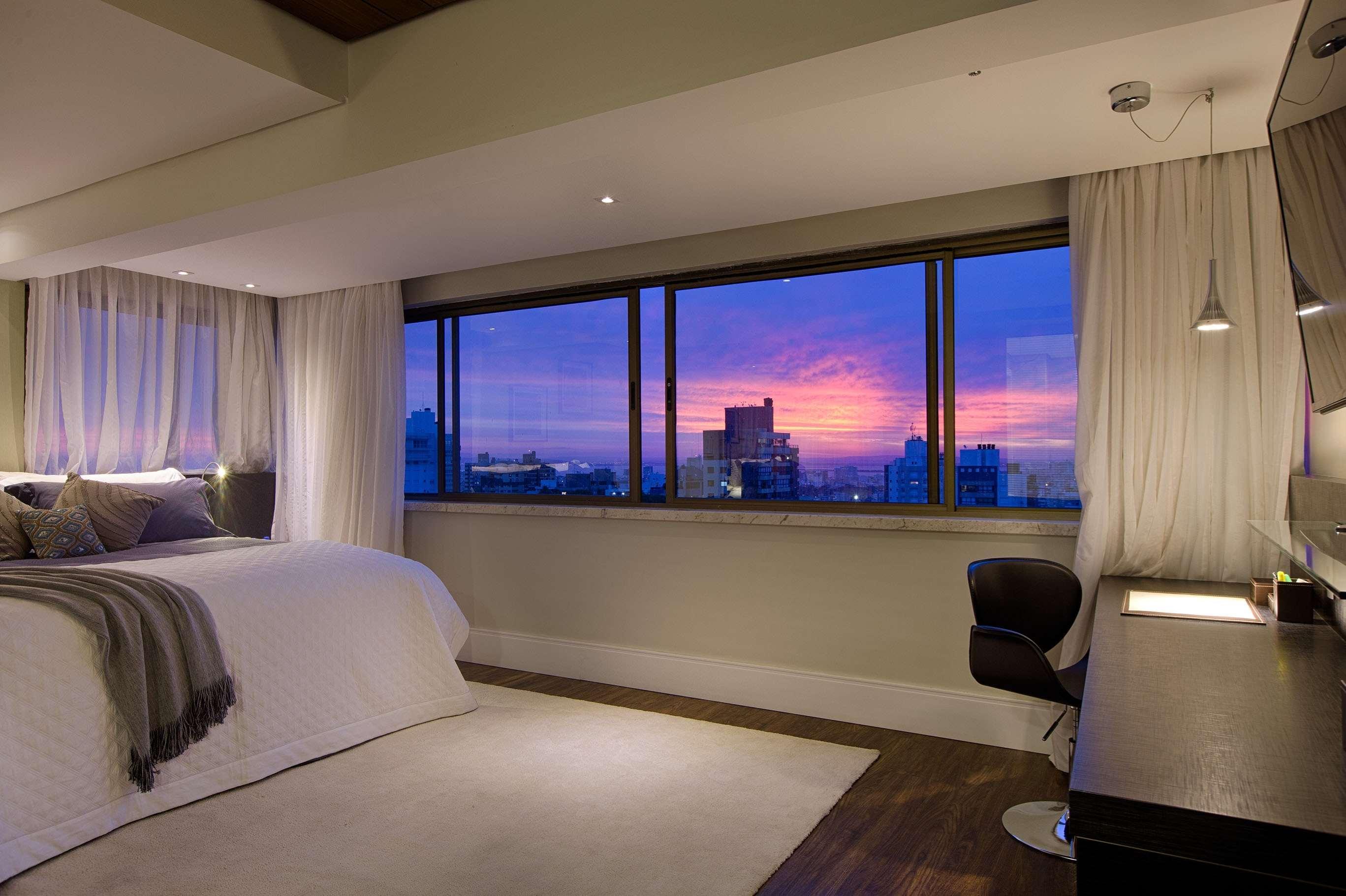 래디슨 호텔 포르투 알레그레 포르투알레그리 외부 사진 A bedroom in a condominium